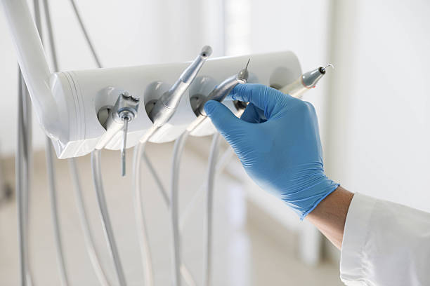 Professional Tooth Extraction technician working in Glennville, GA